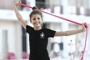 Karolina Tarasova during an exercise with a rope at a training session