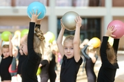 Young gymnasts during training