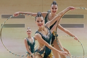 Gymnasts during an exercise with hoops