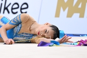 Gymnast during exercise with ribbon