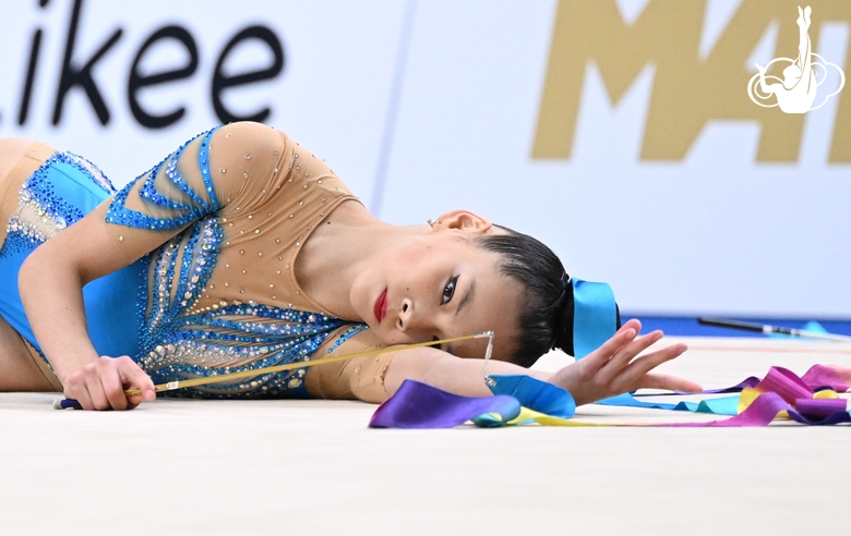 Gymnast during exercise with ribbon