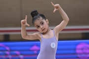 Young gymnast во время выступления at the mAlinka tournament