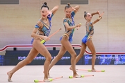 Gymnasts during an exercise with clubs