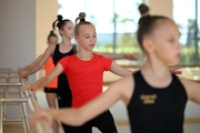 Gymnasts practice choreography during the recovery camp at the Academy