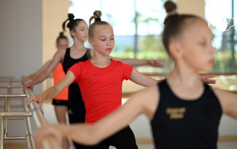 Gymnasts practice choreography during the recovery camp at the Academy