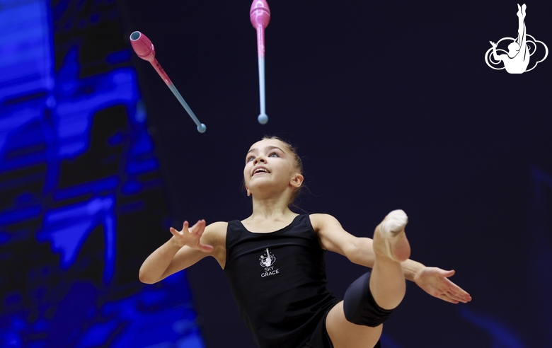 Ksenia Savinova during an exercise with clubs  at floor testing