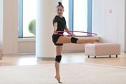 Mariia Borisova during an exercise with a hoop during preparation training for the BRICS Games