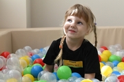 Young gymnast during training at the Academy