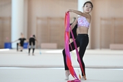 A gymnast from China during the ribbon exercise when training