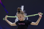 Gymnast during an exercise with a jump rope at floor testing