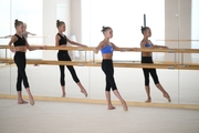 Gymnasts practice choreography during the recovery camp at the Academy