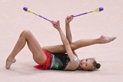 Kristina Voitenko during an exercise with clubs at an assessment training session