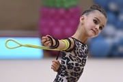 Young gymnast during an exercise with a jump rope at the mAlinka tournament