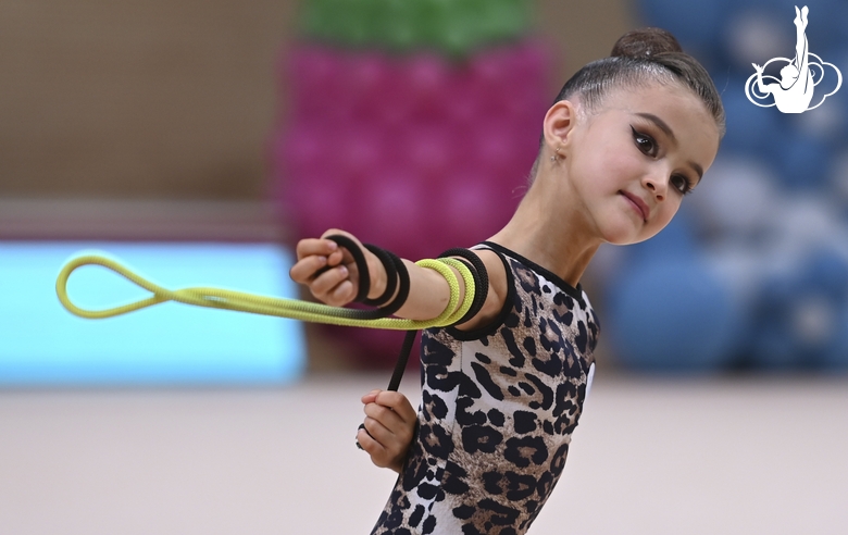 Young gymnast during an exercise with a jump rope at the mAlinka tournament