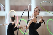 Gymnast from the Amur Tiger society during an exercise with a hoop