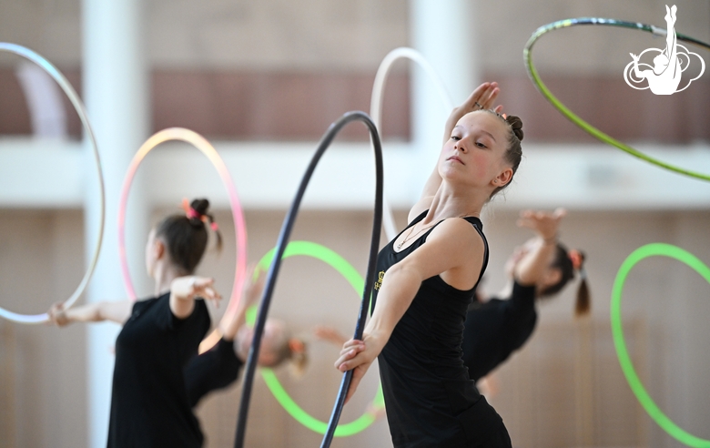 Gymnast from the Amur Tiger society during an exercise with a hoop