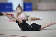 Young gymnast during training