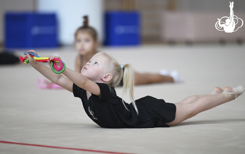 Young gymnast during training