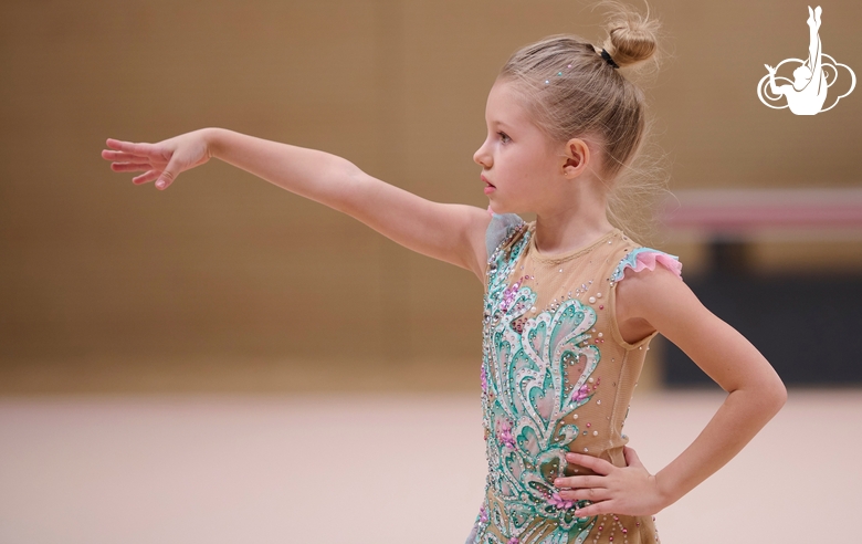 Young gymnast during the workout