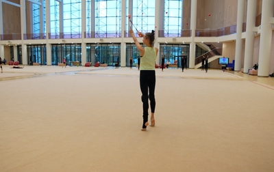 Alina Kabaeva and Academy coach Olga Minigalina works with Yana Zaikina on details in performance