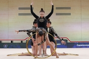 Gymnasts during an exercise with hoops