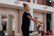 Gymnast working on technique with a jump rope