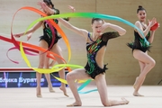 Gymnasts during an exercise with balls and ribbons