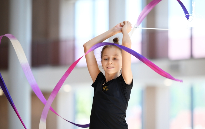 Gymnast during exercise with ribbon