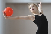 Kristina Voitenko during an exercise with a ball at training