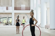 Young rhythmic gymnast from Gatchina poses during a class