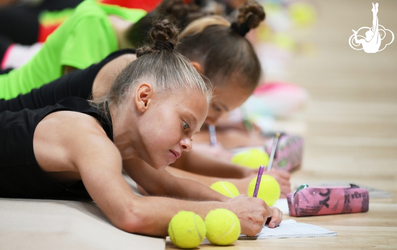 Gymnasts during a session with a psychologist at the training camp in the Academy