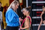 Academy coach Evgenia Eliseeva is preparing Ksenia Savinova for the performance