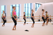 Gymnasts practice choreography during the recovery camp at the Academy