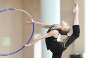 Elvira Belyaeva does a hoop exercise