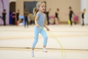 Young gymnast during training