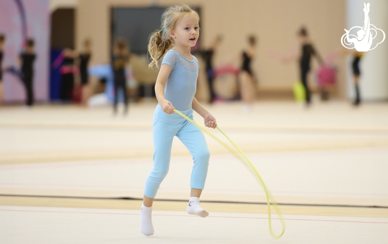 Young gymnast during training