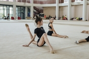 Camp participants improve stretching in the training room