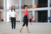 Coach Elizaveta Chernova and gymnast Avani Nitesh Kadam during training