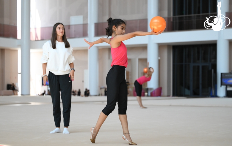 Coach Elizaveta Chernova and gymnast Avani Nitesh Kadam during training