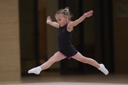 Young gymnast during training