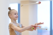 Kristina Voitenko during an exercise with clubs at a control training session