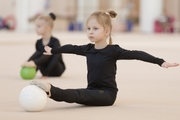 Young gymnasts during training