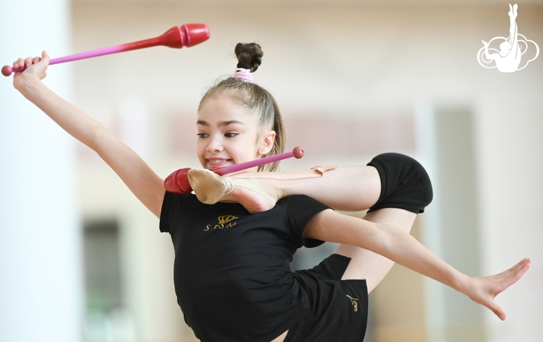 Ksenia Savinova performs an element with clubs