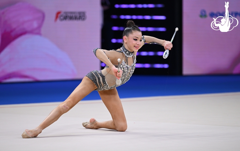 Ulyana Janus during an exercise with clubs