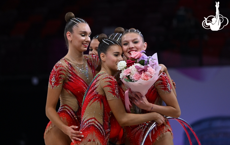 Group team gymnasts from the Ryazan region during an exercise with balls and hoops
