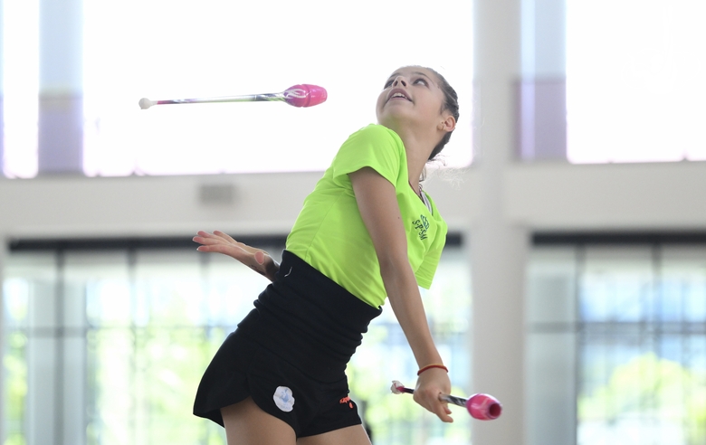 Karolina Tarasova during an exercise with clubs