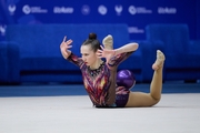 Takhmina Ikromova during an exercise with ball
