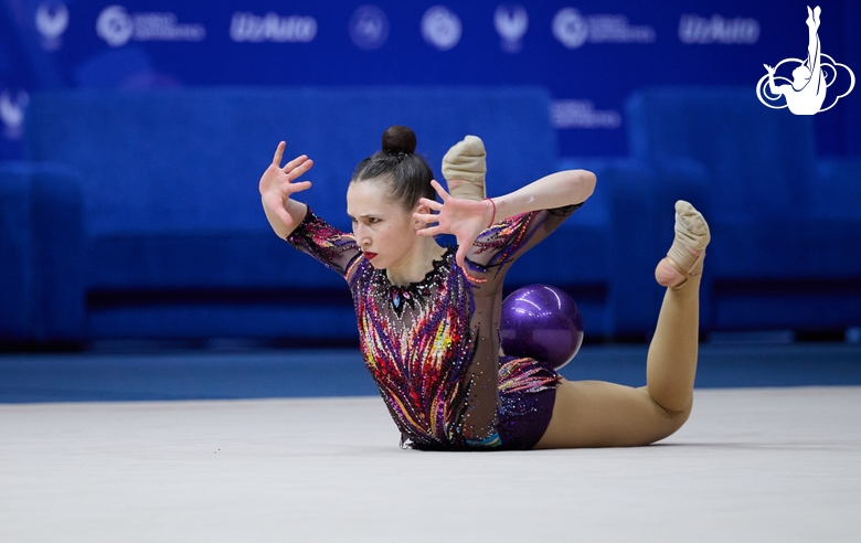 Takhmina Ikromova during an exercise with ball