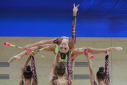 Gymnasts during an exercise with clubs