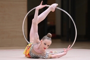 Lada Yakovleva during an exercise with a hoop at a control training session